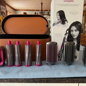 Dyson case and 7 accessories without wand. Never used.